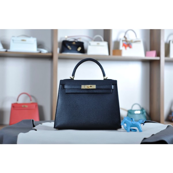 Kelly 28 black gold buckle with extreme pink French sheepskin inside